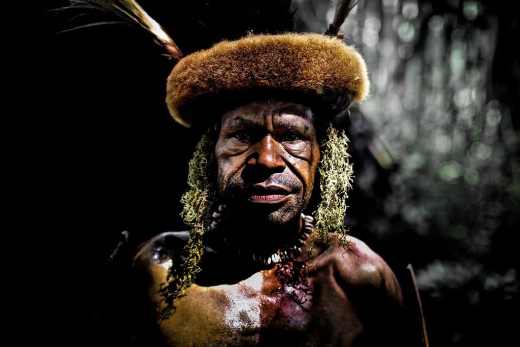A man in tribal attire embodies the immersive jungle ambience available in this sound effects library on Sonniss.
