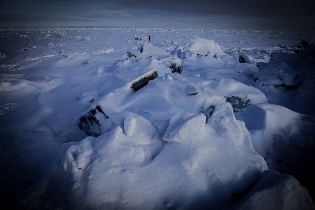 Atmospheric snow-covered rocks & rugged terrain—ideal reference for your sound effects library on Sonniss.