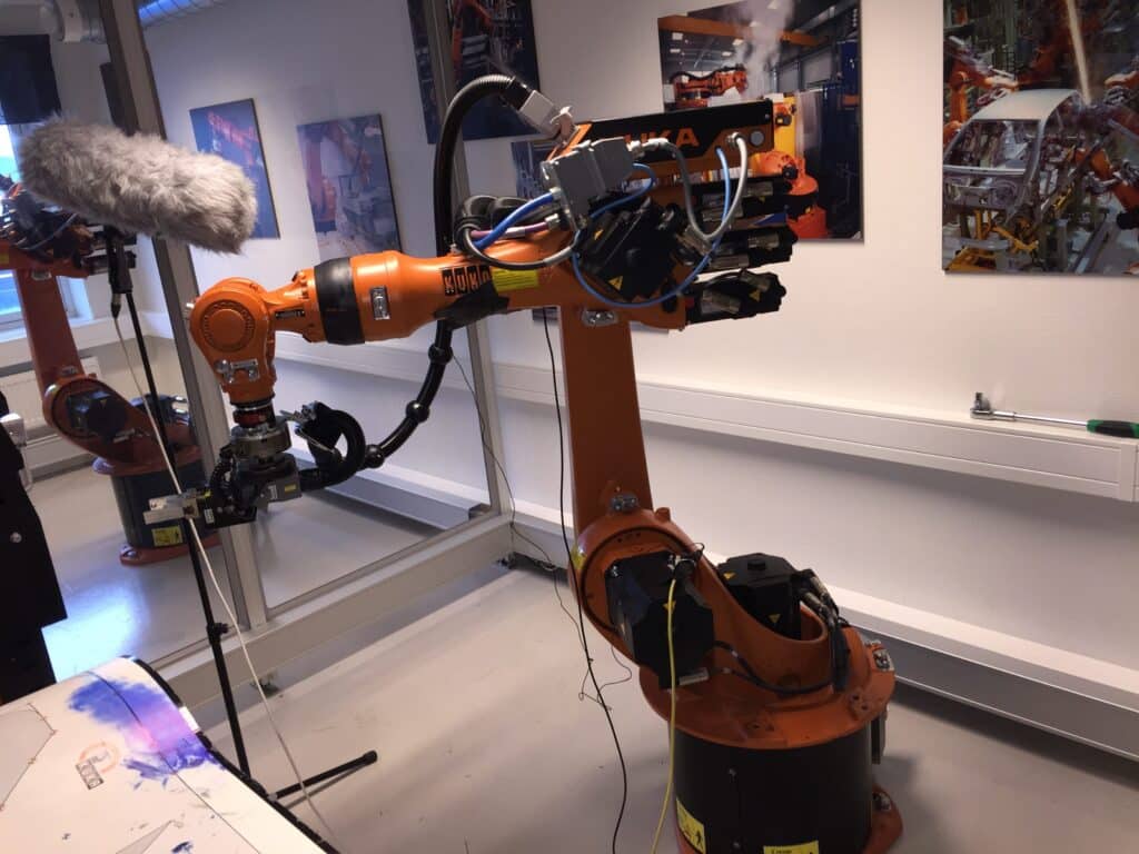 A robotic arm with a microphone records new hydraulics & pneumatics sound effects for Sonniss’ sfx library workspace image.