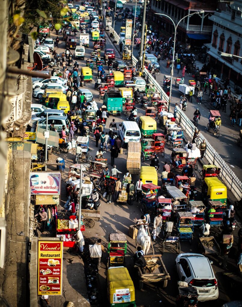 Overhead view for city traffic sound library: bustling urban street sfx—cars, rickshaws & vendors—Sonniss Worldwide Ambience.