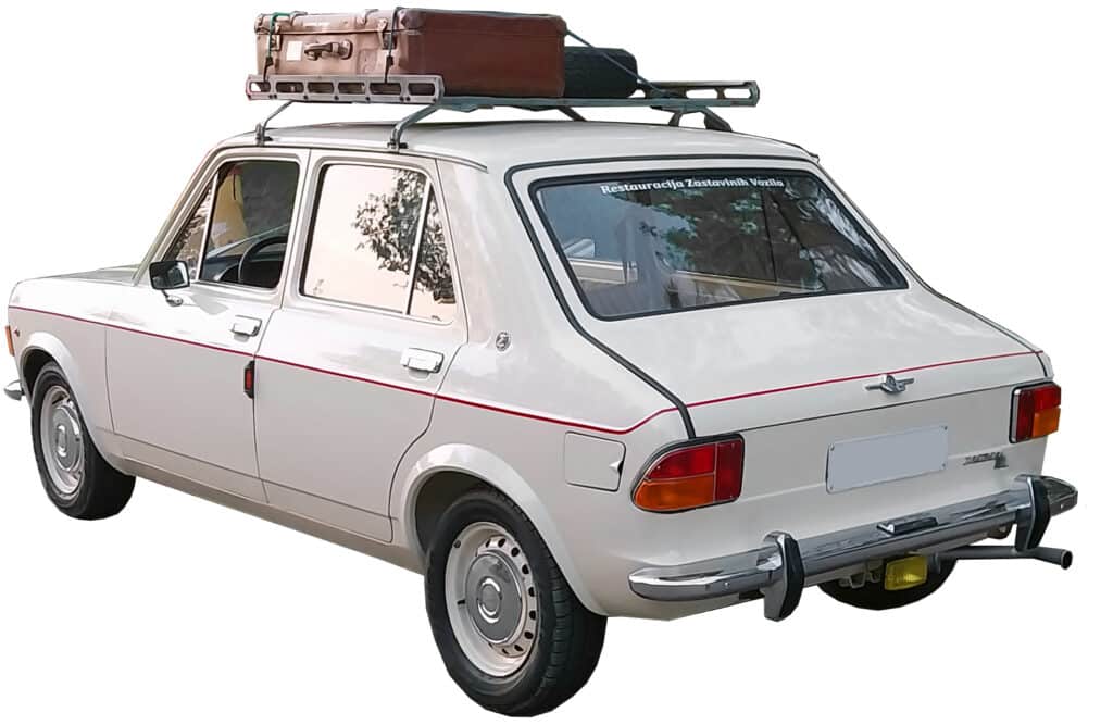 Explore Sonniss's sound effects library: a vintage white car with luggage, ideal for realistic road trip sfx.