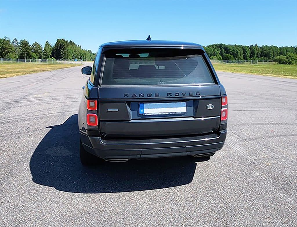The image portrays a black land rover parked on an empty road, illustrating a scene you might find in a sound effects library on Sonniss.