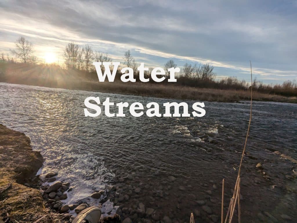 A sound effects library image on Sonniss: River flowing over rocks at sunset for water streams sfx and nature ambience needs.