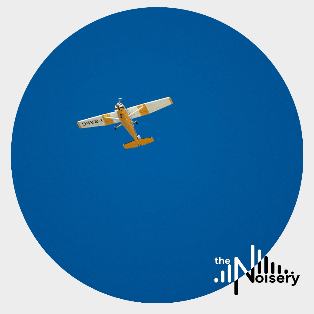 An airplane in clear blue sky—image for aircraft flyover sound effects library on Sonniss, with "the Noisery" logo.