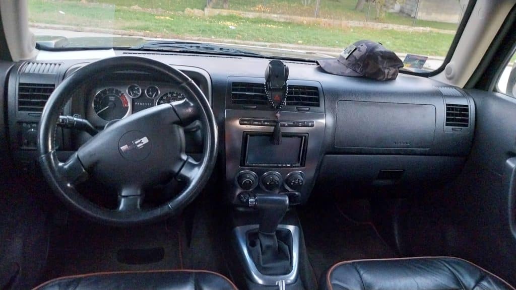 Car interior for sound effects library: steering wheel, dashboard, console with device—ideal SFX source for vehicle ambiance.