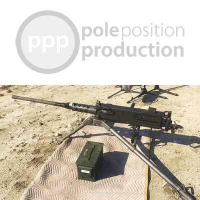 An M2 Browning .50 cal set up outdoors for a machine gun sound effects library on Sonniss, ammo box on sandy ground.