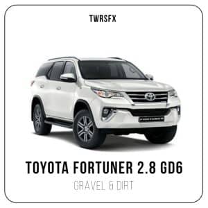 White Toyota Fortuner 2.8 GD6 SUV at a three-quarter front angle on white background, with "TOYOTA FORTUNER 2.8 GD6" and "GRAVEL & DIRT" below.