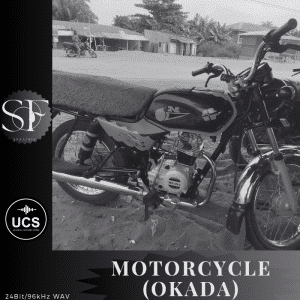 Black-and-white view of a parked motorcycle labeled "MOTORCYCLE (OKADA)" in a rural setting with buildings, trees, and corner logos.