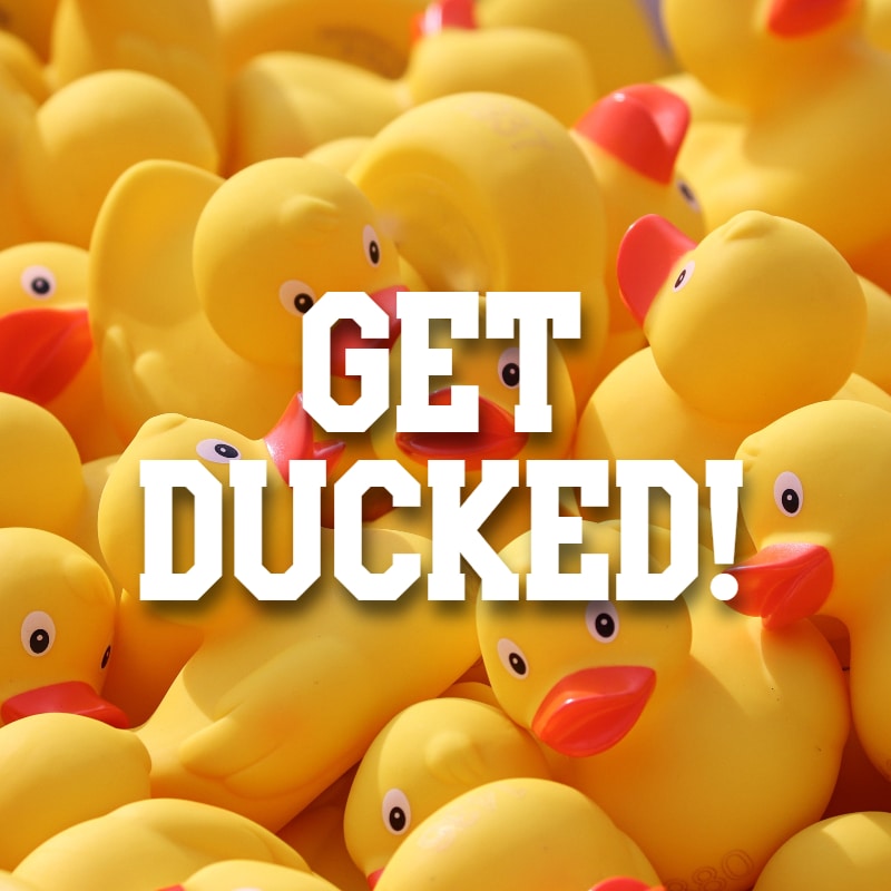 Yellow rubber ducks piled together fill the background, with bold white text in the center reading "GET DUCKED!".
