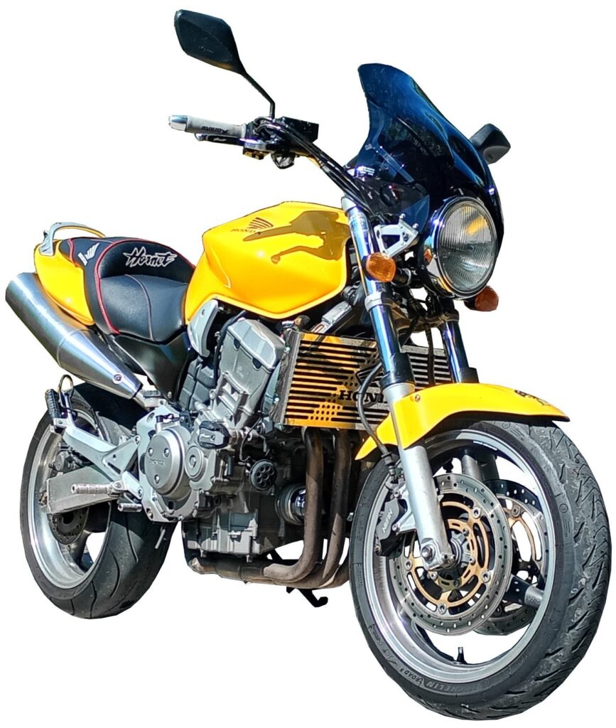 Yellow Honda Hornet motorcycle featuring a black seat and windshield, shown from the front left side against a white background.