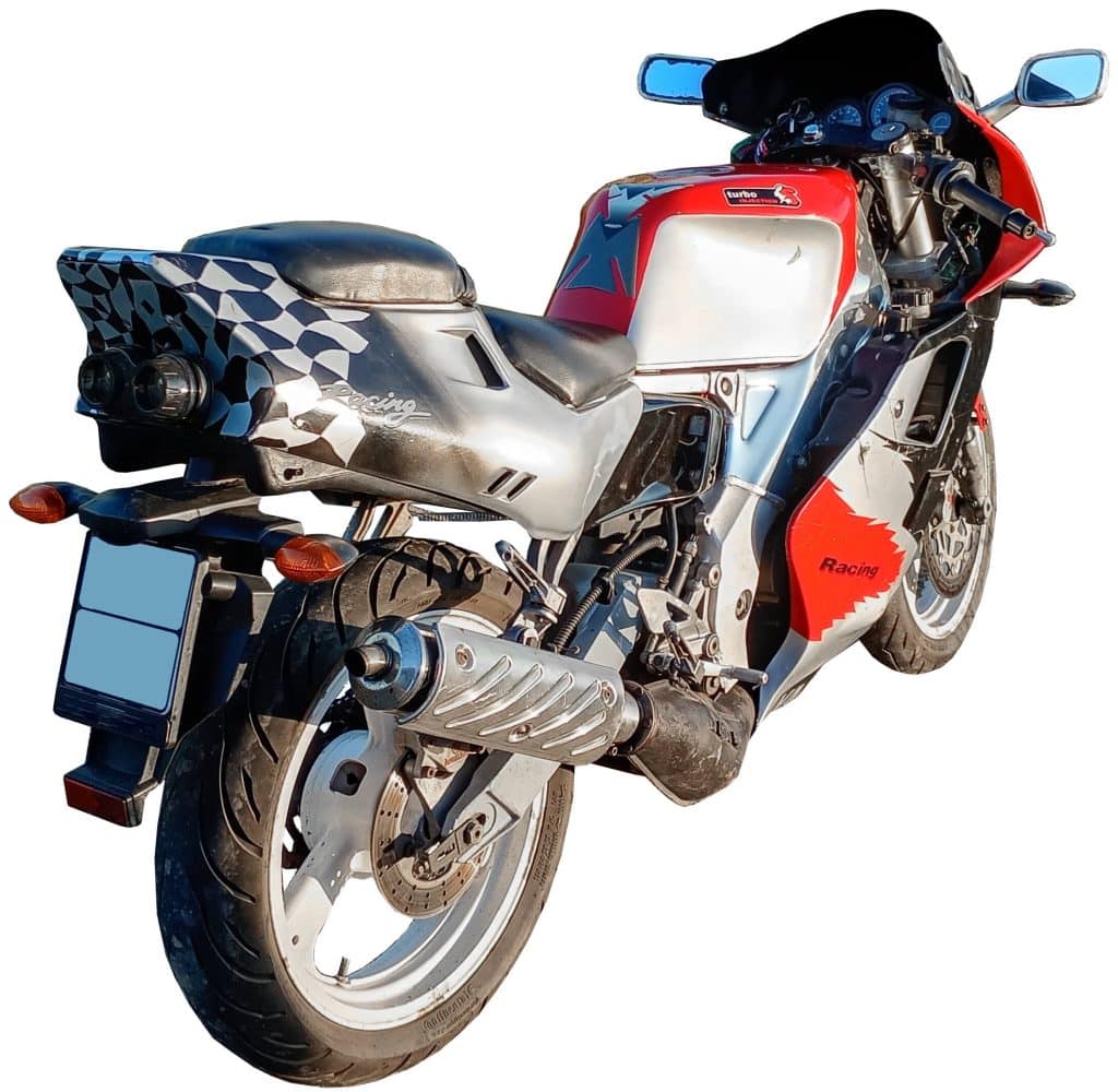 Red and silver sports motorcycle featuring a racing design, black windshield, and a checkered pattern on the rear, viewed from the back left side.
