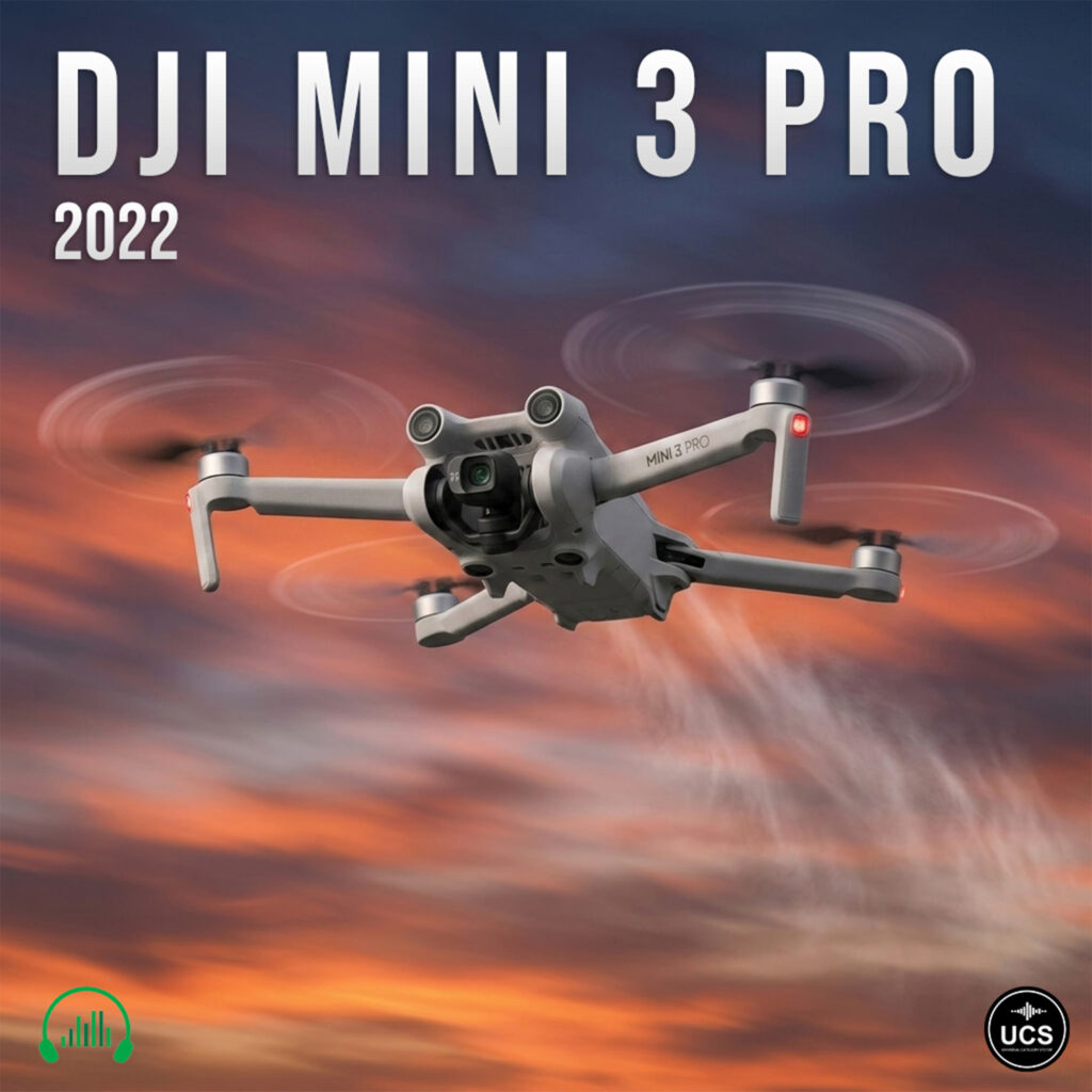 Grey DJI Mavic 3 Pro 2023 UAD drone with spinning propellers flies against a cloudy sunset sky.