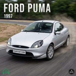 Silver 1997 Ford Puma two-door sports car driving along a curved asphalt track.