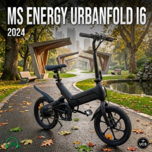 MS Energy Urbanfold i6 2024 folding electric bicycle in black parked on a paved park path with autumn leaves.