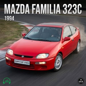 A red 1994 Mazda Familia 323C two-door sports hatchback turns on a paved race track.