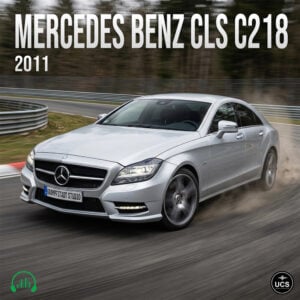 Silver 2011 Mercedes Benz CLS C218 sports sedan cornering on a racetrack.
