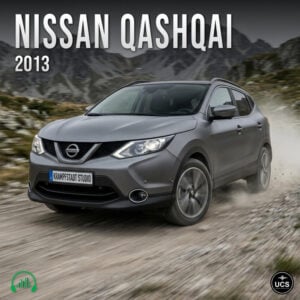 2013 grey Nissan Qashqai compact crossover SUV driving on a dirt road in front of mountains.