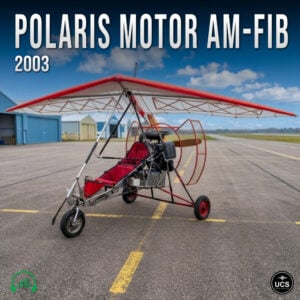 Polaris Motor AM-FIB 2003 ultralight trike with red and white wing, red seats, and propeller on airfield tarmac.