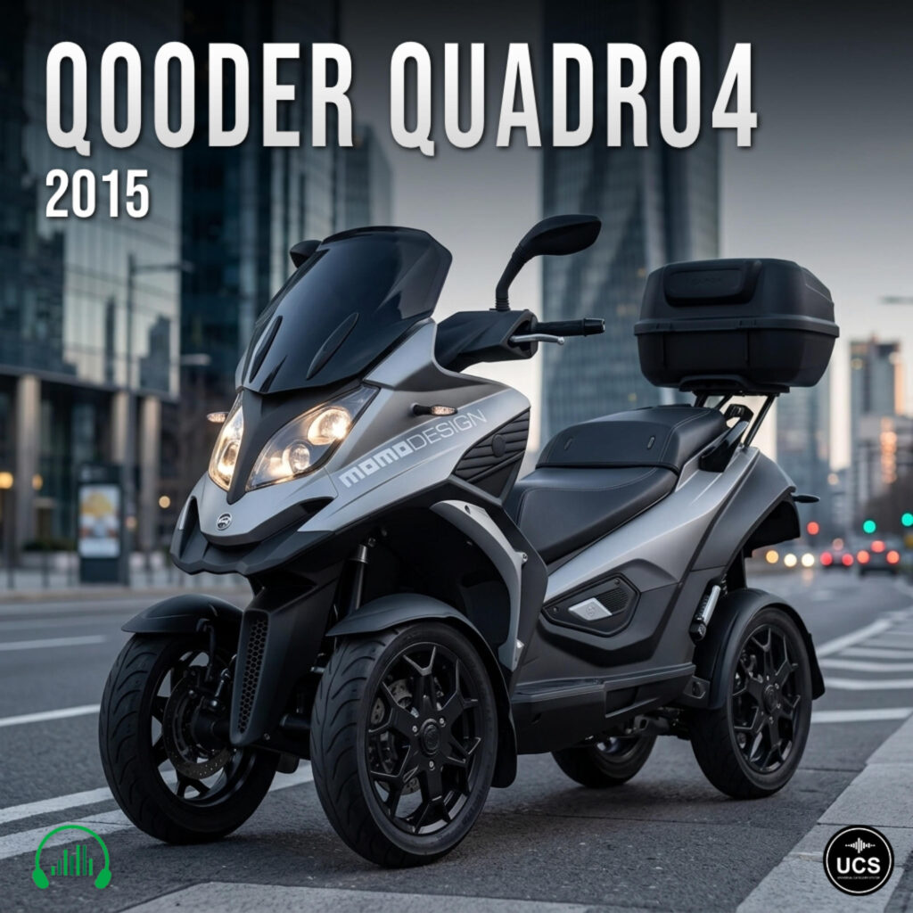 Silver 2015 Qooder Quadro4 quadricycle scooter with a black top box is parked on a city street.