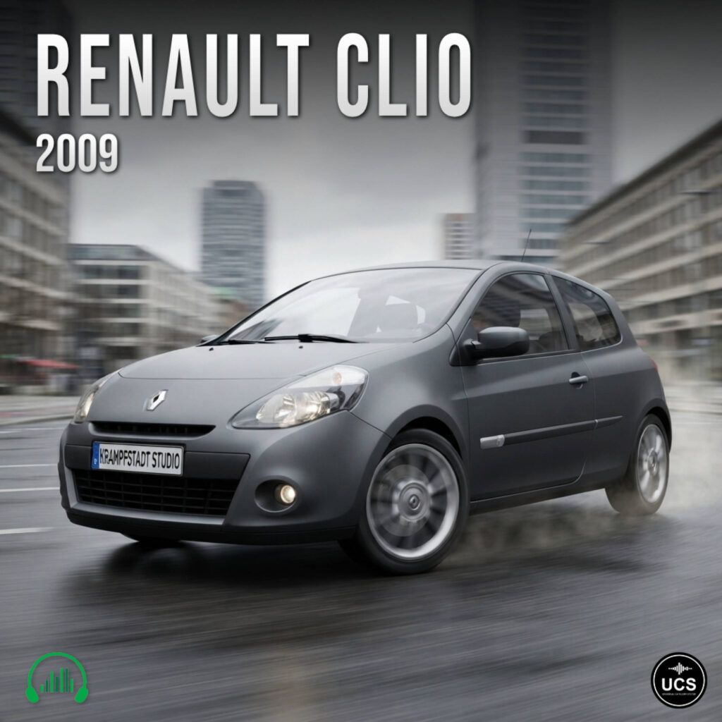 Grey 2009 Renault Clio subcompact supermini car driving on a wet city street.