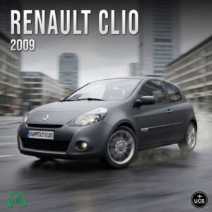 Grey 2009 Renault Clio subcompact supermini car driving on a wet city street.