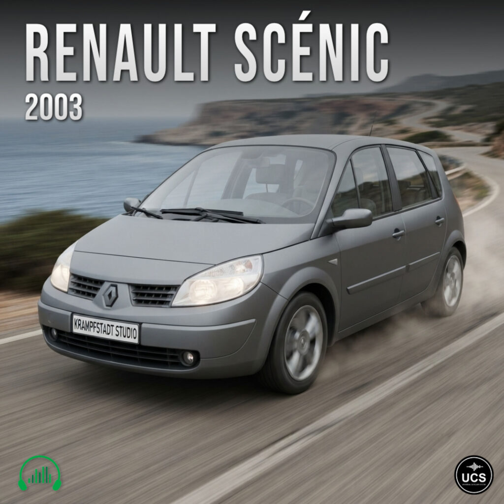 Grey 2003 Renault Scenic compact MPV minivan drives along a winding coastal road.