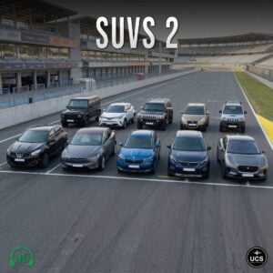 Ten SUVs are parked in two rows on a racetrack starting grid.
